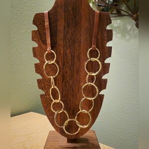 Vintage Chicos gold tone link necklace with leather strapping